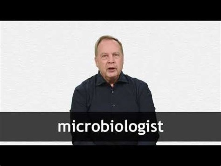 What is the definition of microbiologist?