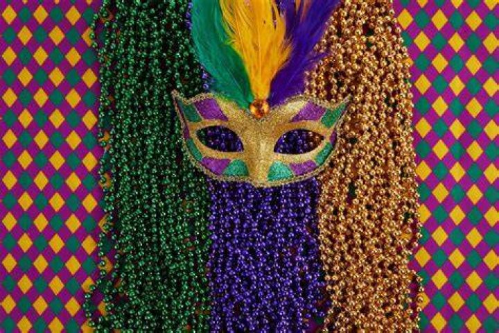 Why are mardi gras colors purple and green?